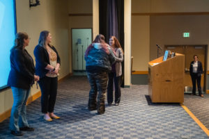 BBCC Trustee Juanita Richards hands a certificate to Audra Pierce