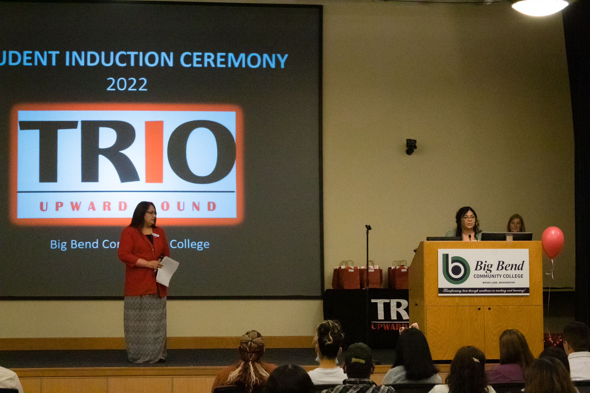 trio academic advisor erika armengol talks to students and parents during the trio induction
